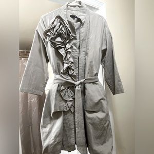 Khaki belted jacket.